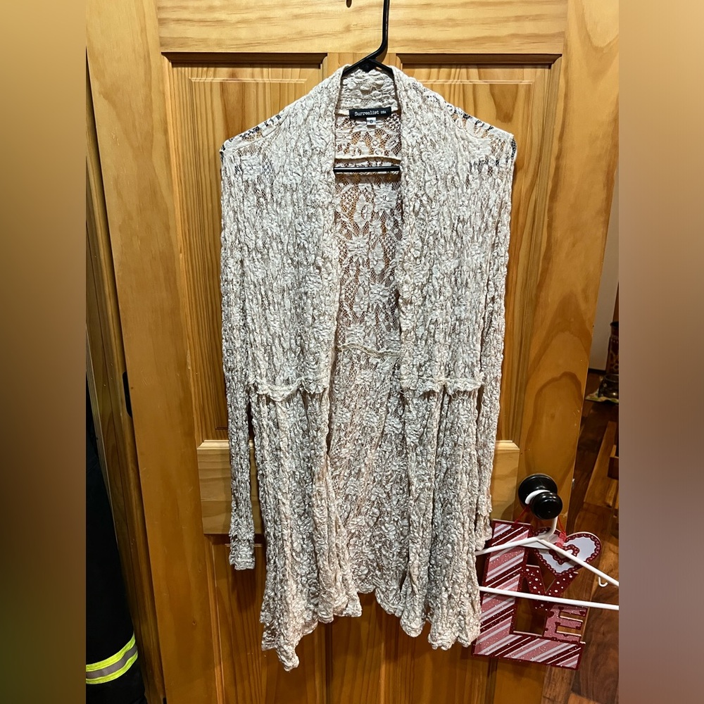 Surrealist lace sweater